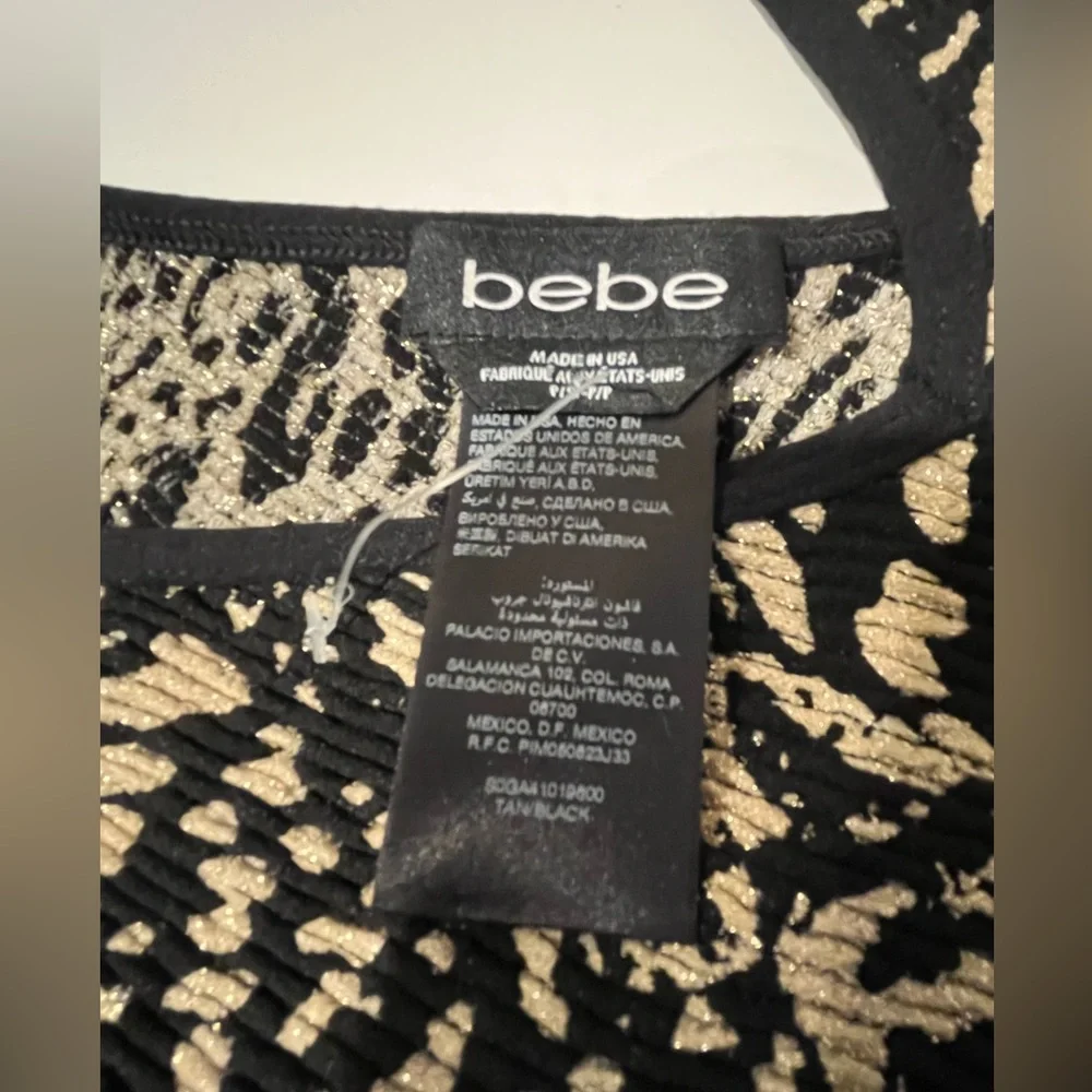 BEBE Stretch Nylon/Spandex w/Gold Metallic Accents Cap Sleeve “V”Neck Mini Dress - Picture 5 of 10